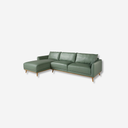 sofá esquinero tapizado en piel color verde con patas de madera estilo escandinavo
