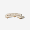 sofá rinconero piel beige con patas de madera clara moderno