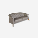 sofa estilo chester con patas de madera