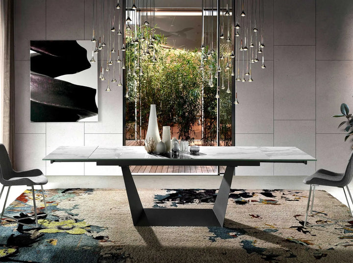Mesa comedor extensible rectangular mármol porcelánico y acero negro