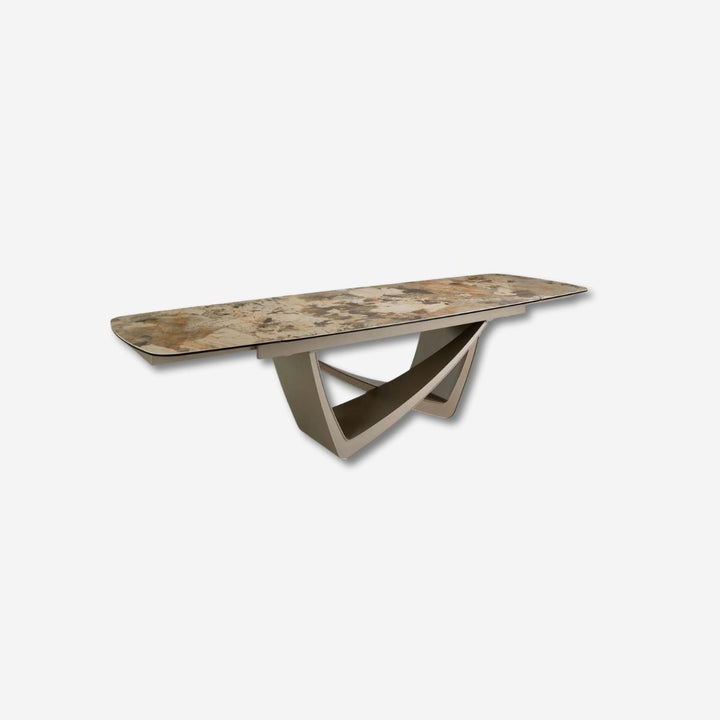 Mesa comedor extensible ovalada barril mármol porcelánico y acero taupé metalizado