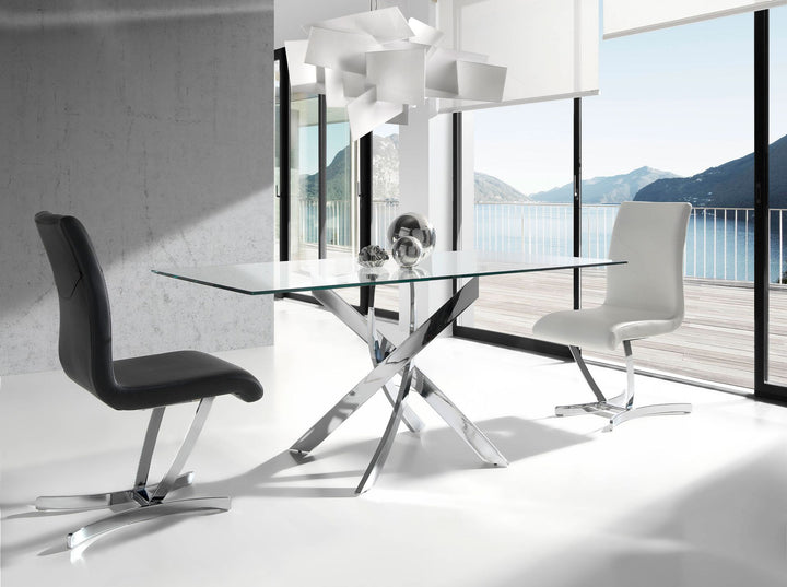 Mesa comedor rectangular cristal templado y acero cromado en ambiente decorado
