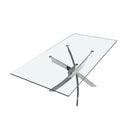 Mesa comedor rectangular de cristal templado con patas de acero en aspa acabado cromado, detalle del canto pulido