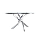 Mesa comedor redonda de cristal templado con patas de acero en aspa acabado cromado, vista lateral