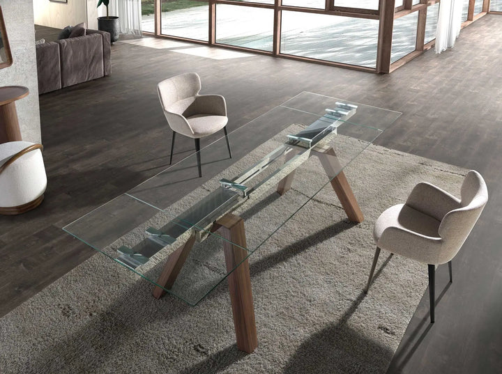 Mesa comedor extensible rectangular cristal templado y nogal en ambiente decorado
