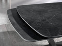 Extendable oval barrel dining table with porcelain marble and black steel