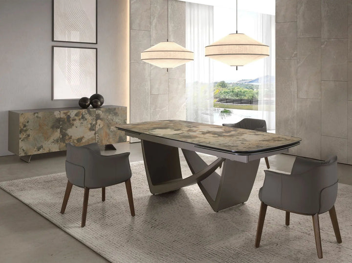 Mesa comedor extensible ovalada barril mármol porcelánico y acero taupé metalizado