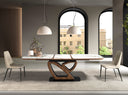 Mesa comedor extensible ovalada barril mármol porcelánico y nogal