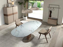 Mesa comedor extensible ovalada barril mármol porcelánico y nogal