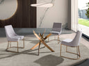 Mesa comedor rectangular de cristal templado con patas de acero en aspa acabado oro rosa, en un comedor decorado