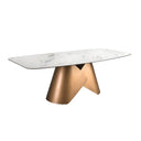 Mesa comedor ovalada barril mármol porcelánico y acero color bronce