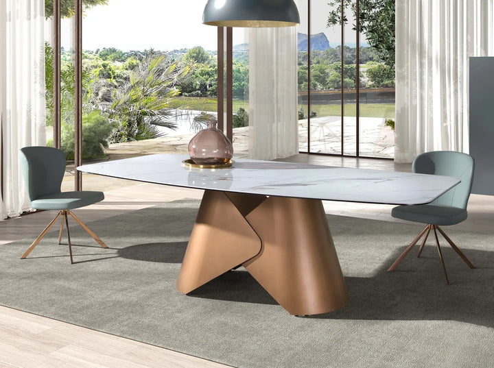 Oval barrel dining table in porcelain marble and bronze-colored steel
