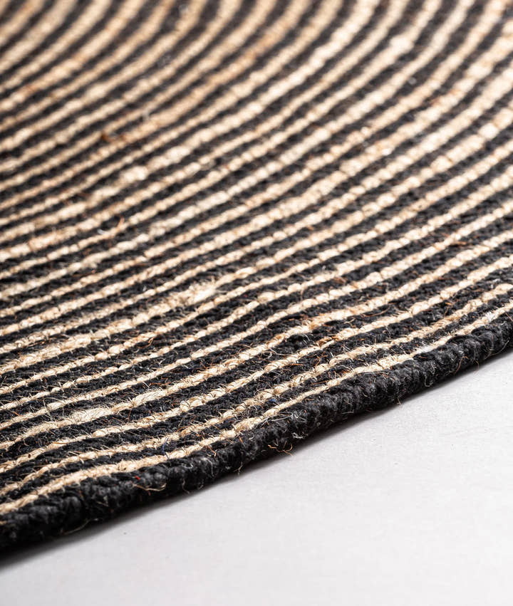 ALFOMBRA LEANDRA DE ALGODÓN BEIGE CON DETALLES NEGROS REDONDA - Alfombras - El Workshop - algodón