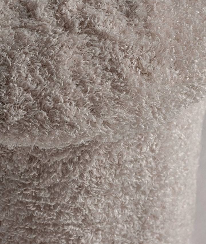 Reposapiés JONZAC con forma de champiñón tapizado en lana