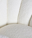 BOUCLÉ ​​CREST swivel armchair