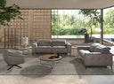 Sillón giratorio piel gris