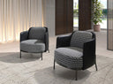 Sillón tela blanca y negra y polipiel negro