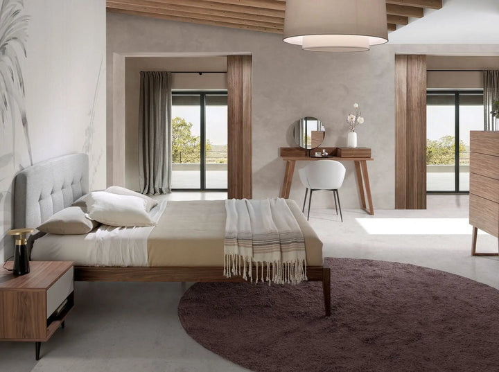 Tufted bed in grey fabric