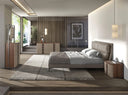 Comfortable leather, walnut, polished steel base and brown smoked glass top