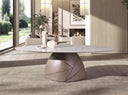 Mesa comedor ovalada mármol porcelánico y acero taupé metalizado en ambiente decorado
