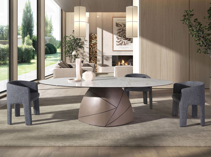 Mesa comedor ovalada mármol porcelánico y acero taupé metalizado en ambiente decorado (2)