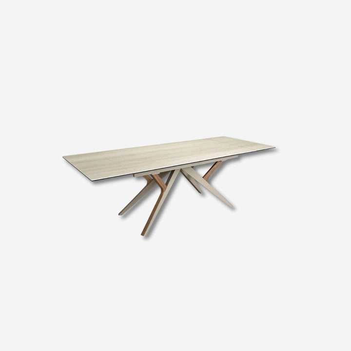 Mesa comedor extensible rectangular mármol porcelánico, acero arena metalizado y nogal