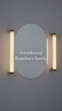 Roseline Wall Lamp 36 - Black base, beige strap and transparent glass shade.
