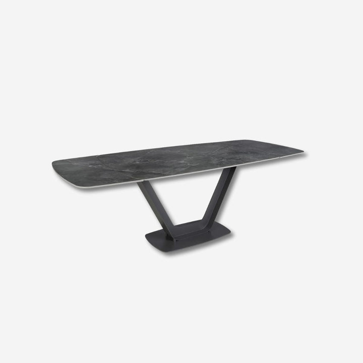 Mesa comedor extensible ovalada barril mármol porcelánico y acero negro