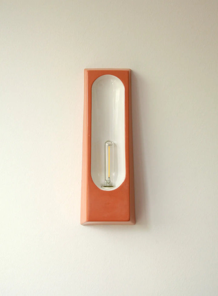 lampara de ceramica naranja de pared