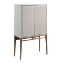 Aparador_alto_de_madera_de_MDF_color_beige_y_unas_originales_patas_de_madera__nogal_natural y estilo modero