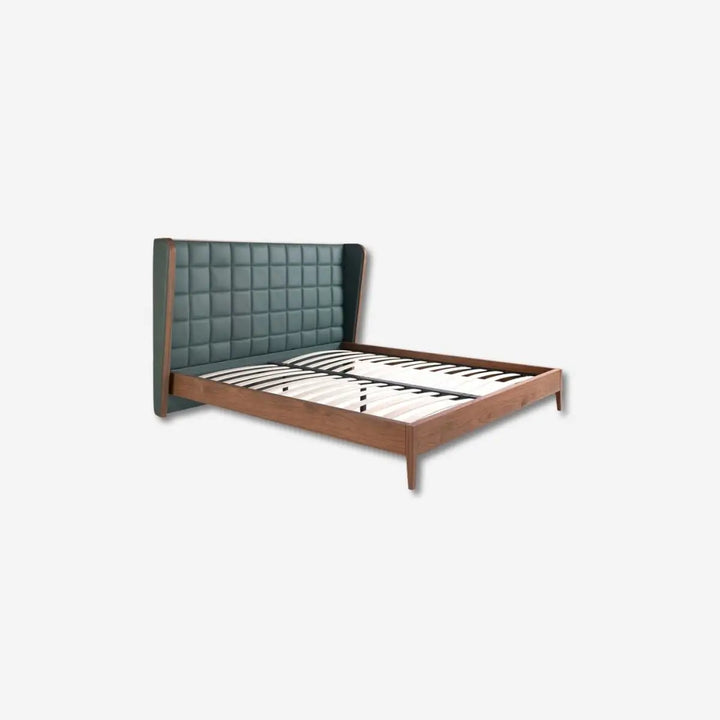 Dark green leatherette bed