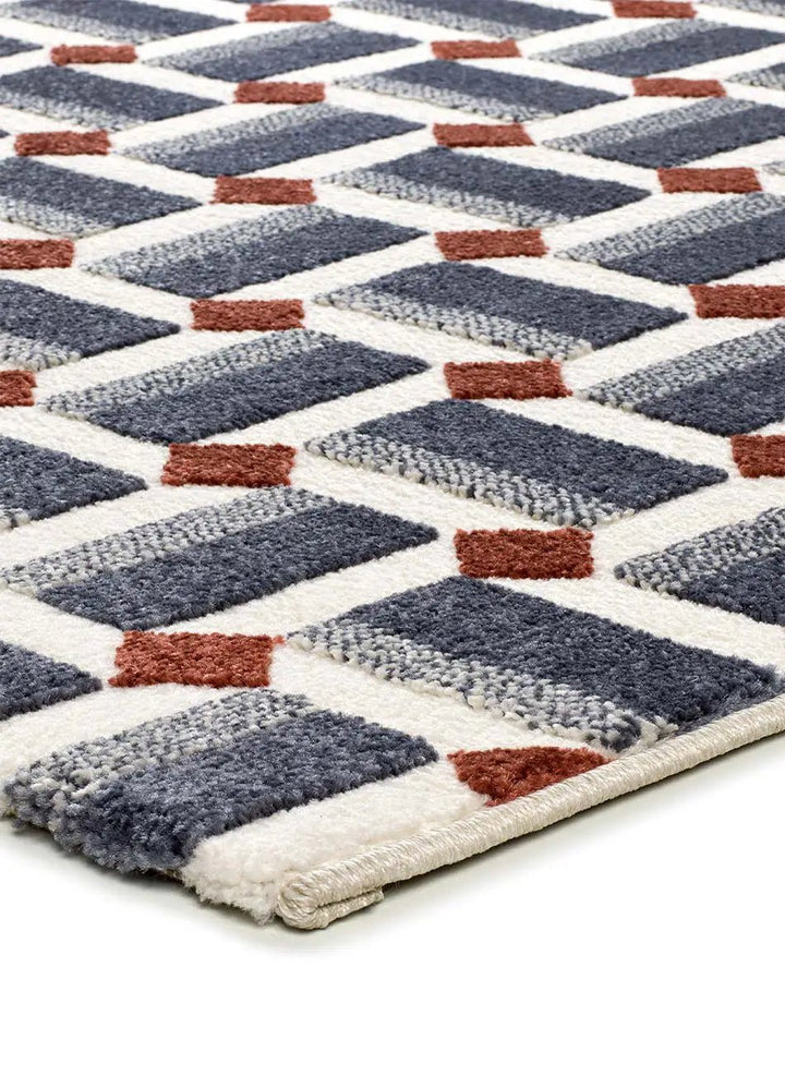 ALFOMBRA AMARA 13000 DE ESTILO GEOMÉTRICO EN COLOR AZUL en ambiente decorado (2)