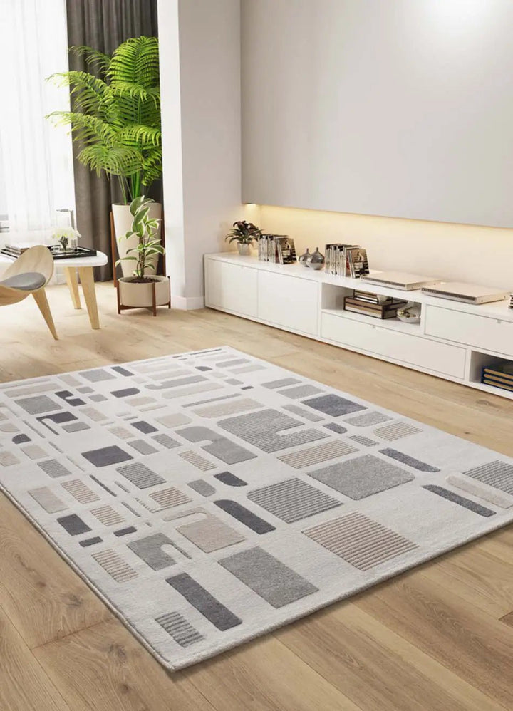ALFOMBRA FLORA 12955 DE ESTILO GEOMÉTRICO CON RELIEVE EN COLOR PLATA