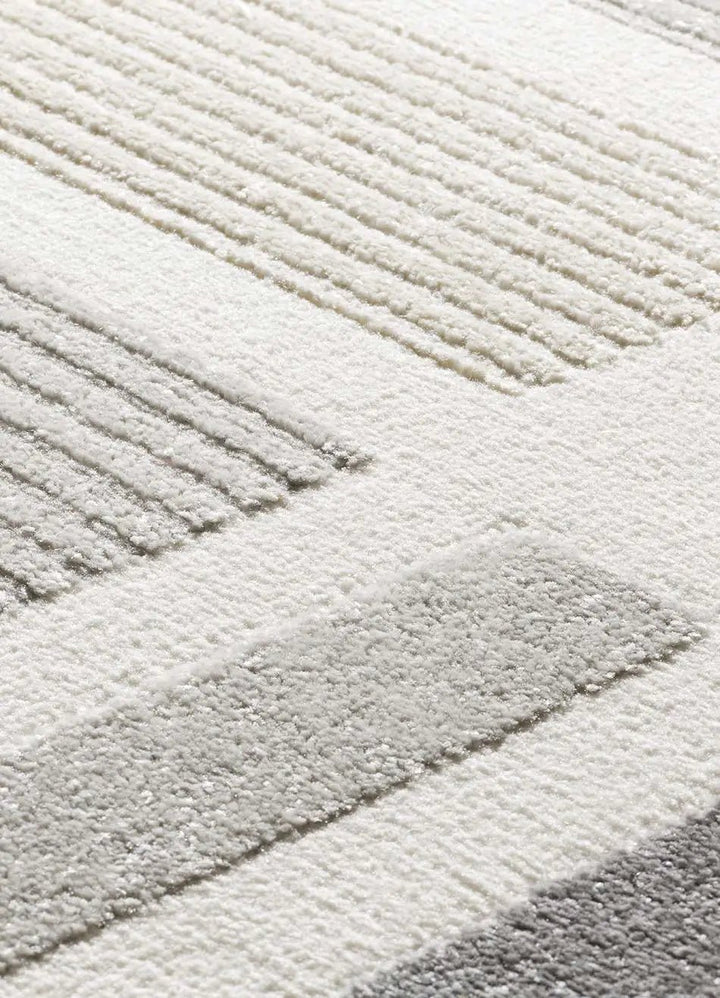 ALFOMBRA FLORA 12955 DE ESTILO GEOMÉTRICO CON RELIEVE EN COLOR PLATA en ambiente decorado (3)