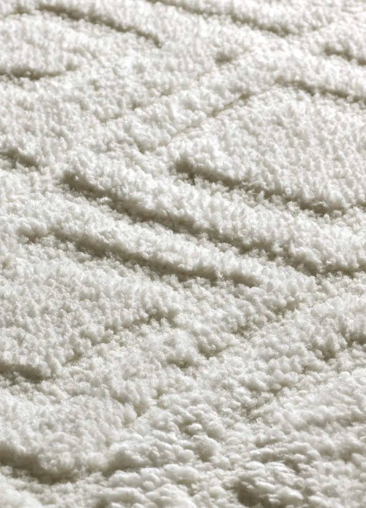 ALFOMBRA JUNO 111 DE ESTILO ESCANDINAVO CON RELIEVE EN COLOR BLANCO - Alfombras - El Workshop-120 x 64 x 1.8 cm