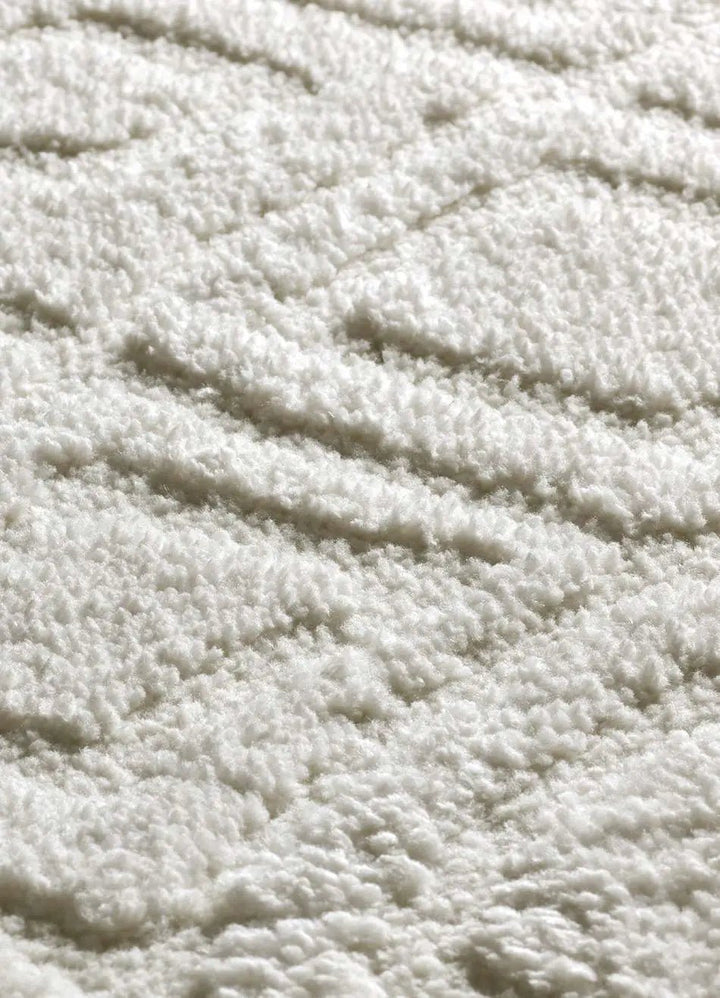 ALFOMBRA JUNO 111 DE ESTILO ESCANDINAVO CON RELIEVE EN COLOR BLANCO - Alfombras - El Workshop-120 x 64 x 1.8 cm