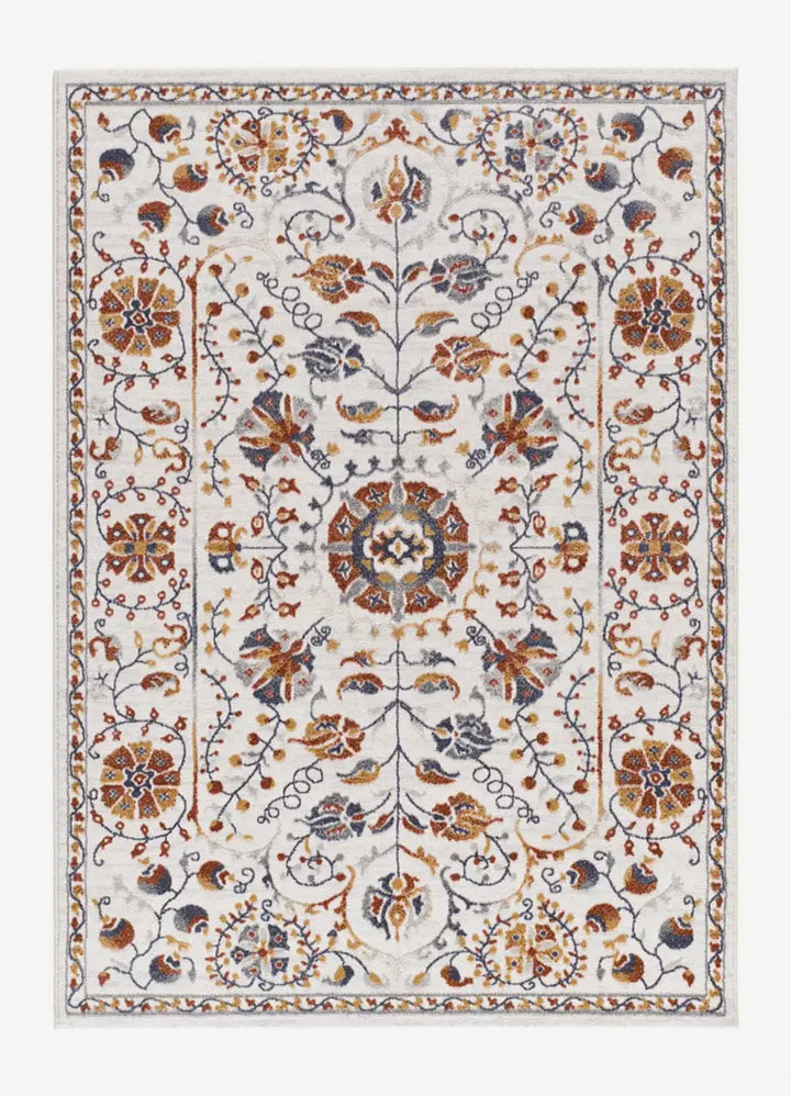 Alfombra Luly 13026 de estilo clásico con relieve en multicolor sobre fondo gris de estudio