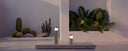 aplique de superficie de exterior redondo de cemento y cristal arena ø14,7 x 35 cm, ambiente