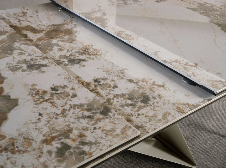 Mesa comedor extensible rectangular mármol porcelánico y acero color champagne
