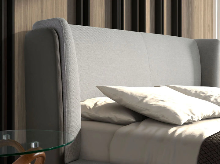 Light gray fabric bed