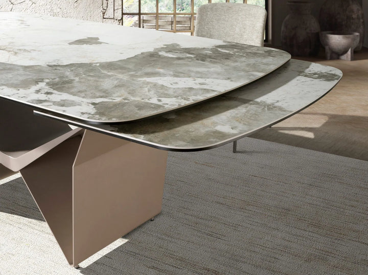 Mesa comedor extensible ovalada barril mármol porcelánico y acero taupé metalizado
