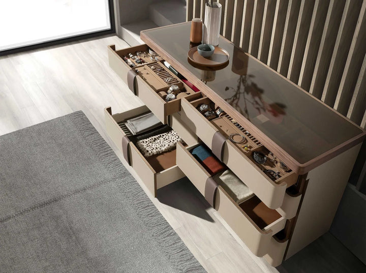 Comfortable leather, walnut, polished steel base and brown smoked glass top