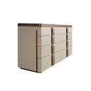 Cómoda piel, nogal, base acero pulido y tapa de cristal fumé marrón