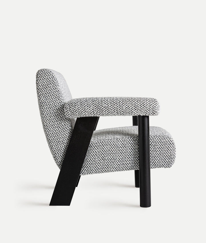 LIESTER armchair upholstered in grey bouclé fabric