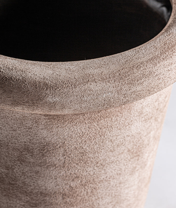 DOLLEY vase finished in light brown color with decorative texture.