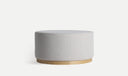 Repose-pieds RUREY rond en tissu avec socle en bois massif