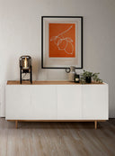 Aparador de lacado blanco y patas de roble en ambiente decorado