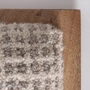 Cabecero tapizado en lana en color beige – detalle