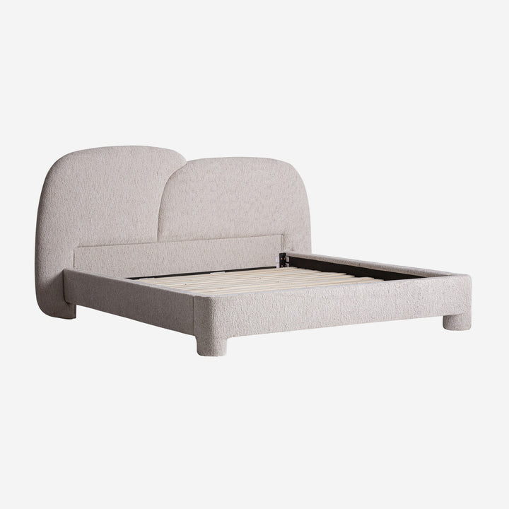 Cama tapizada en poliéster en color beige jaspeado