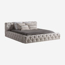 Cama tapizada en tela en color beige